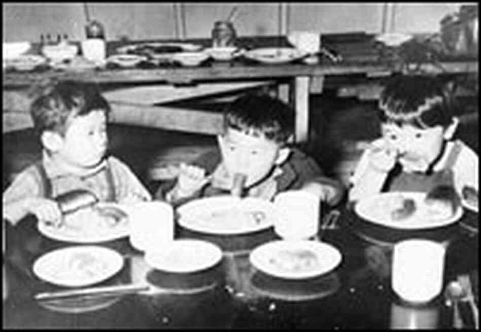 Children eat hot dogs at Idaho's Minidoka Internment Camp.