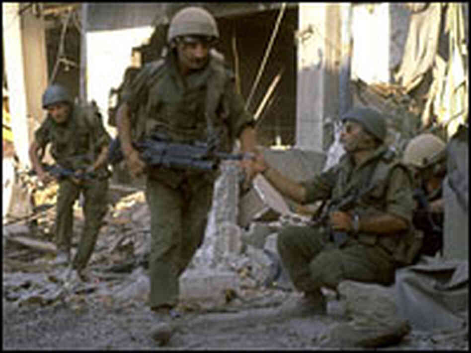 Israeli troops advance in Beirut.