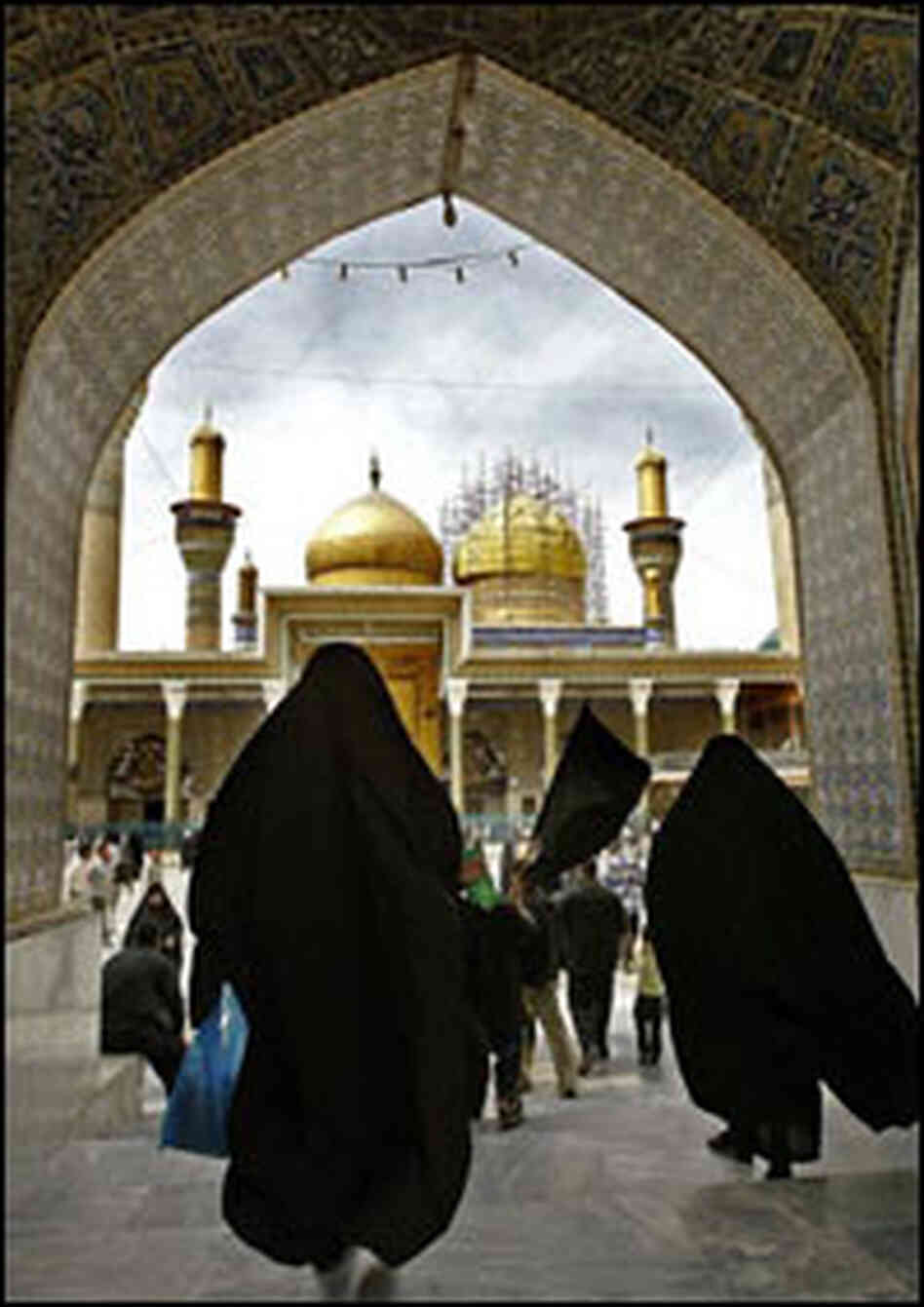 Iraqi women visit the shrine of Imam al-Kazem in Baghdad.