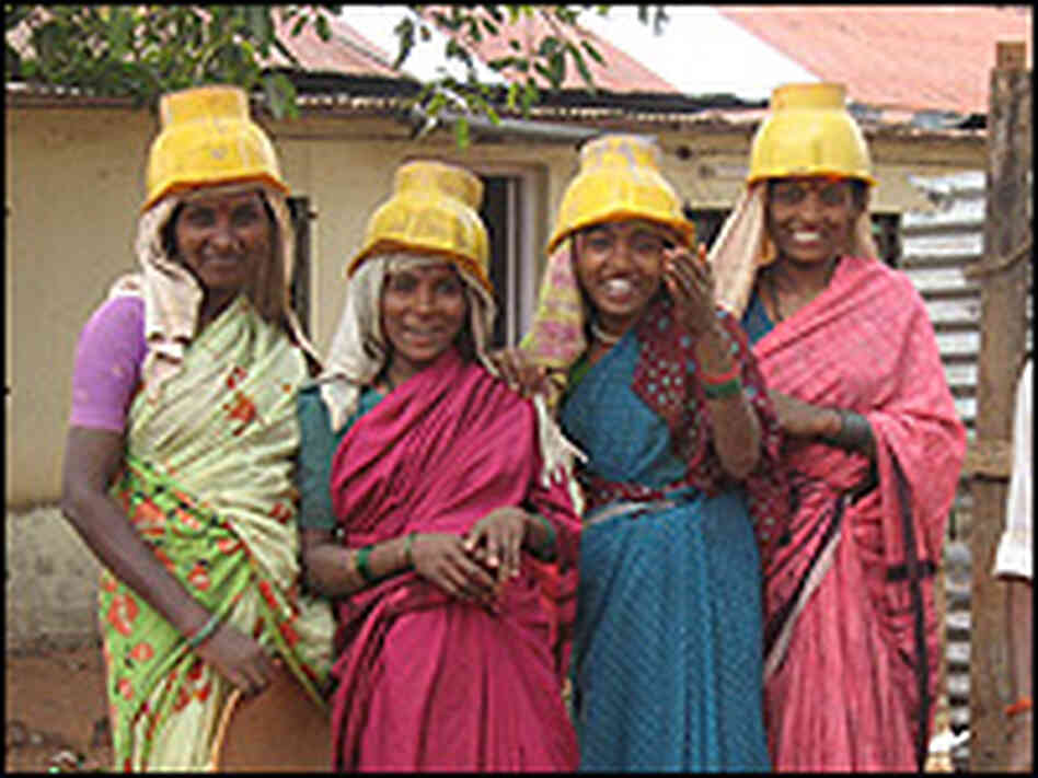 Women helpers at a Bel-Air construction site. Women helpers at a Bel-Air construction site.