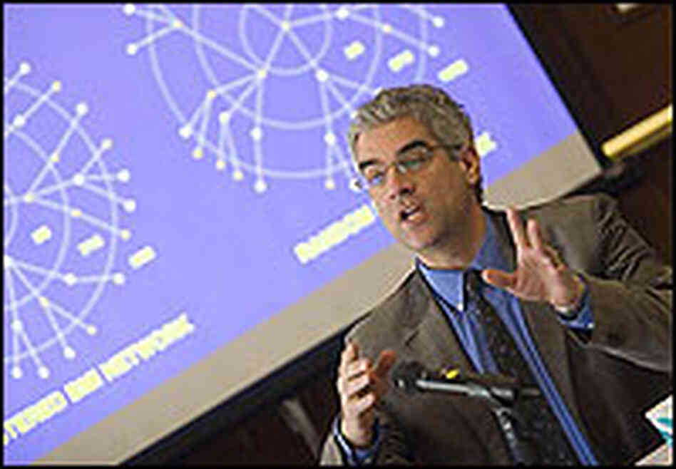Harvard health researcher Dr. Nicholas Christakis stands in front of diagrams of social networks. Harvard health researcher Dr. Nicholas Christakis stands in front of diagrams of social networks.