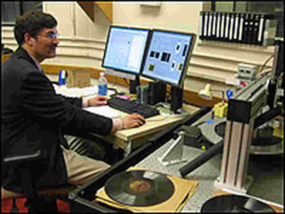 Peter Alyea scans a record from the 1930s.