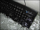 A Seal Shield computer keyboard is submerged in water in a bathtub. A Seal Shield computer keyboard is submerged in water in a bathtub.
