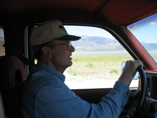 Rancher Dean Baker drives his truck.