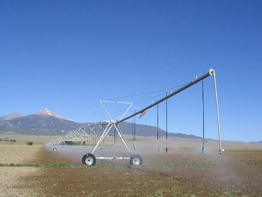 Pivot sprinklers in Snake Valley, Nev., make the desert blossom with alfalfa.