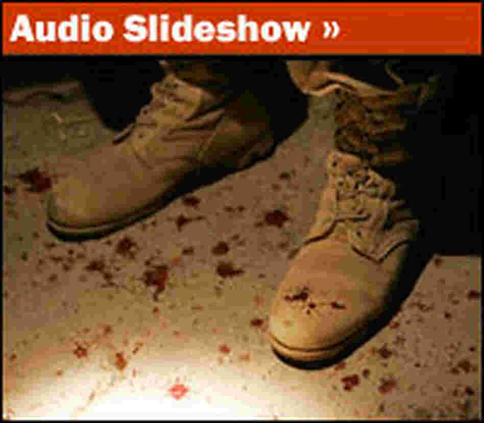 A U.S. soldier's boots splattered by blood.