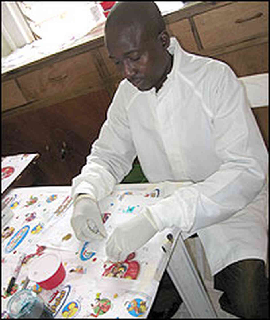 A lab worker at the Carter Center office in Jos, Nigeria, A lab worker at the Carter Center office in Jos, Nigeria,