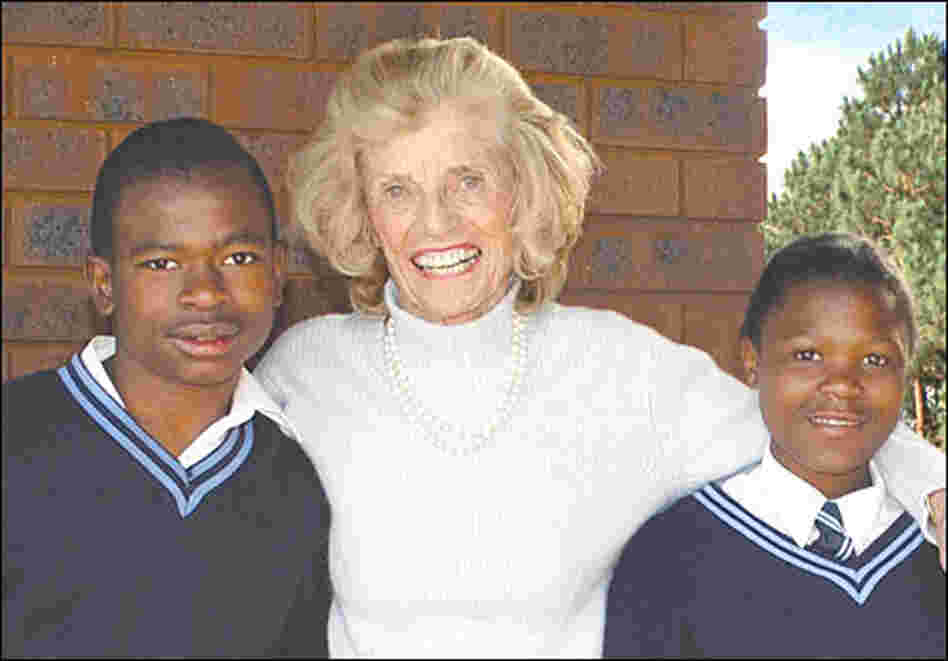 Shriver stands with Special Olympics athletes in South Africa in 2001.