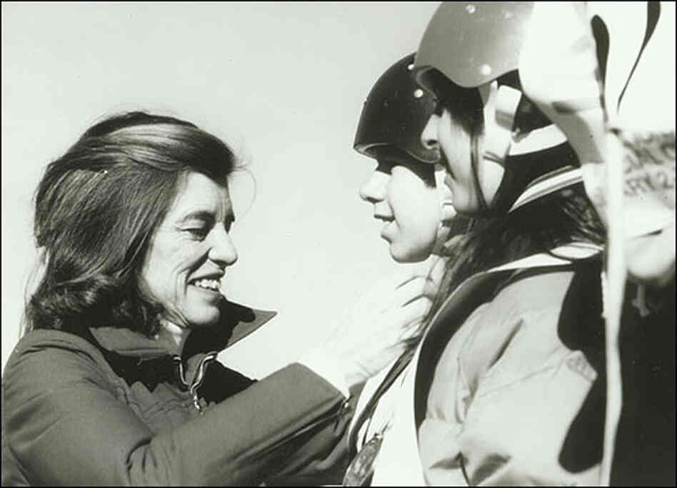 Shriver awards medals to athletes at the Special Olympics in 1968.