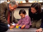 Dr. T. Berry Brazelton, with a young girl and her mother. Dr. T. Berry Brazelton, with a young girl and her mother.