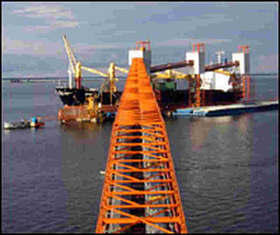 Soy is transferred to the hull of a tanker at Cargill's port in Santarem