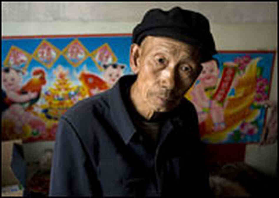 Tou Deyue's son died in a coal mine explosion along with 71 other workers two years ago.