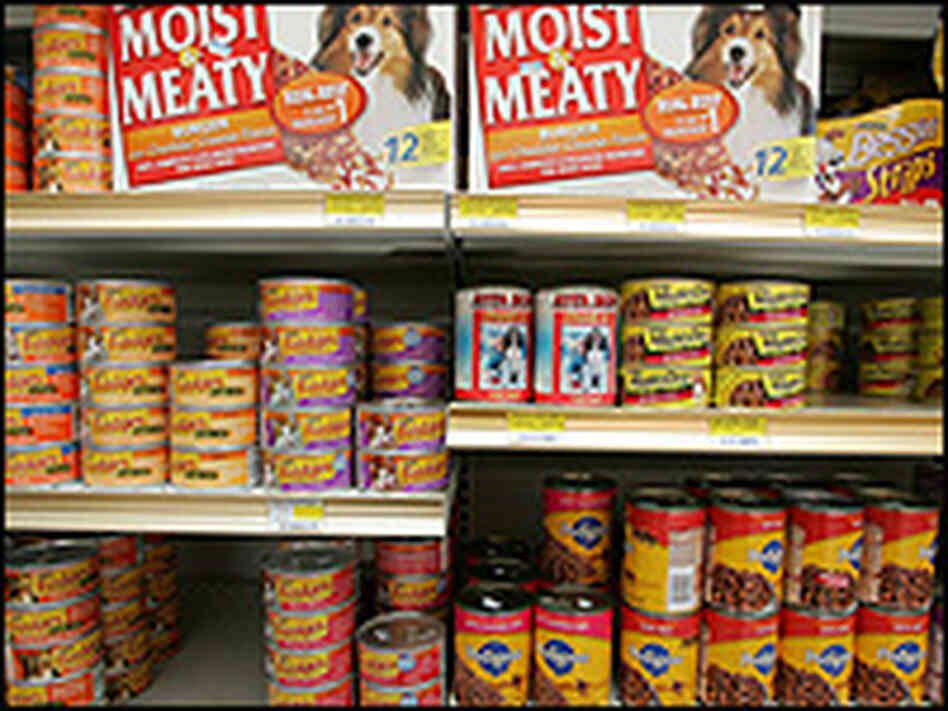 Pet food on a store shelf. Pet food on a store shelf.
