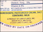 An allergy warning label on a container of sour cream. An allergy warning label on a container of sour cream.