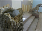 The broken head of an Assyrian-era lion, damaged during the looting of Iraq's national muse The broken head of an Assyrian-era lion, damaged during the looting of Iraq's national muse