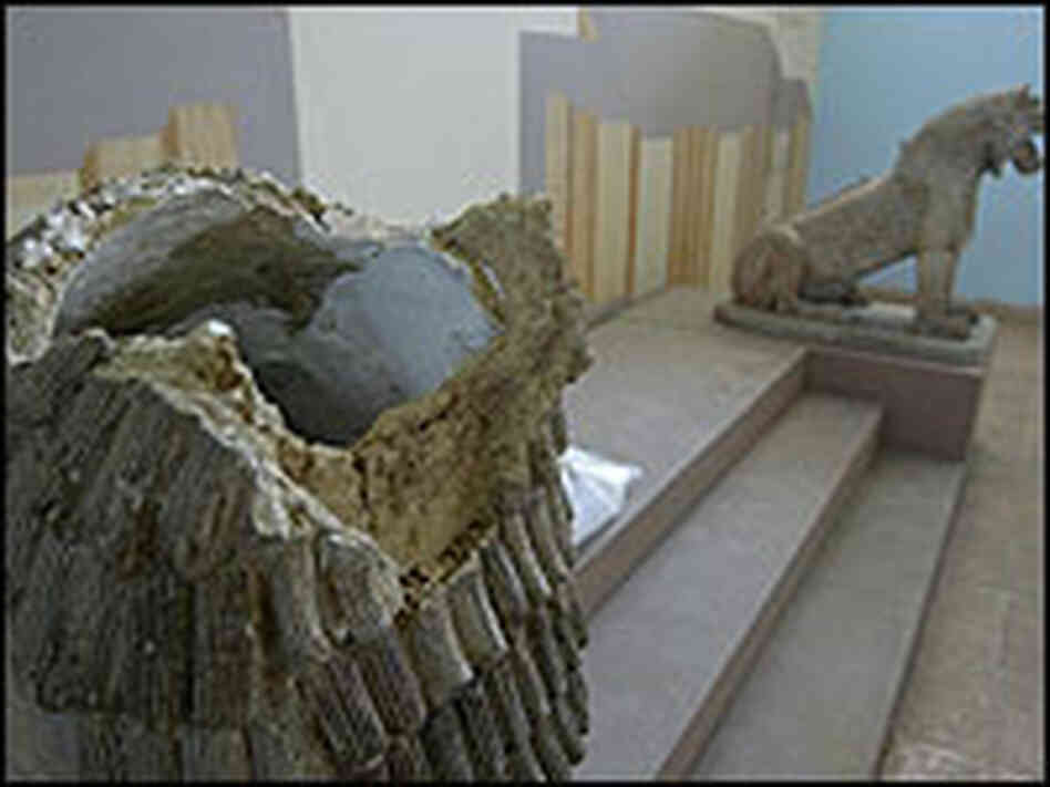 The broken head of an Assyrian-era lion, damaged during the looting of Iraq's national muse The broken head of an Assyrian-era lion, damaged during the looting of Iraq's national muse