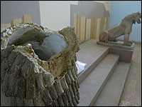 The broken head of an Assyrian-era lion, damaged during the looting of Iraq's national muse