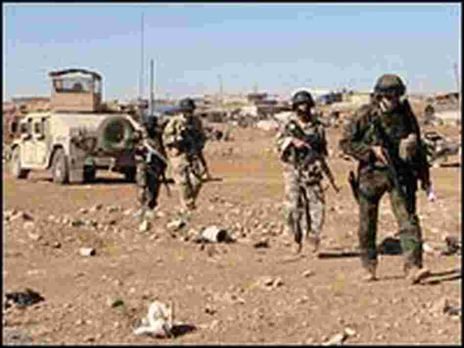 U.S. and Iraqi troops patrol in Mosul.