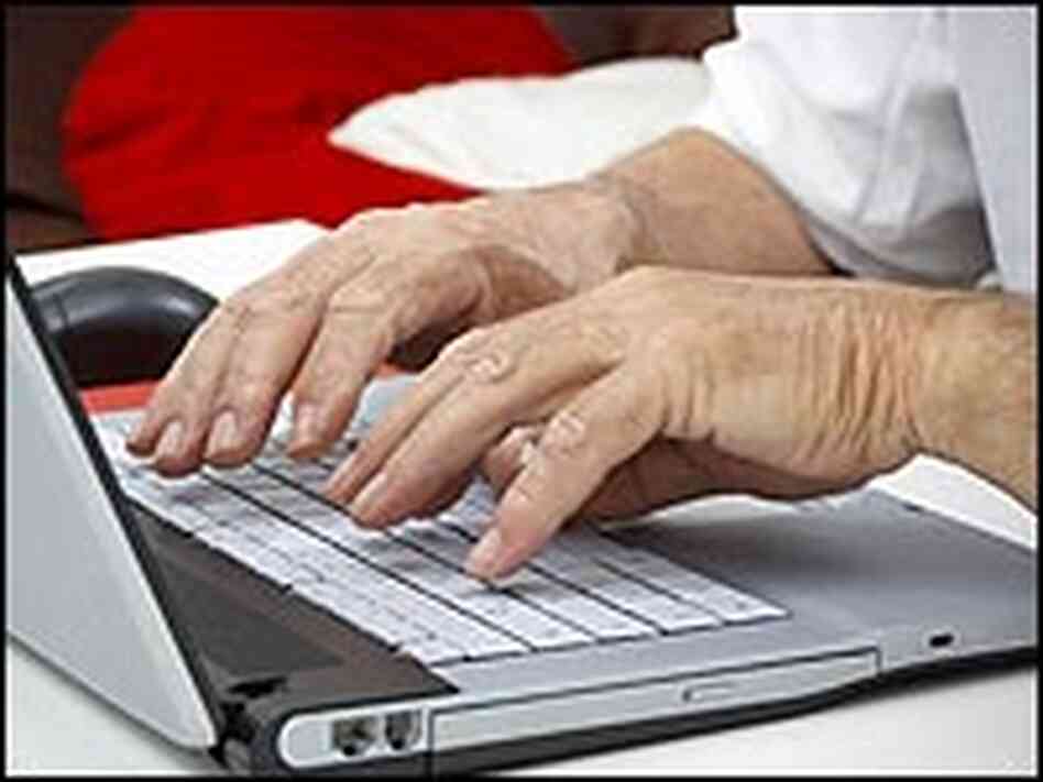 hands typing on a laptop computer. hands typing on a laptop computer.