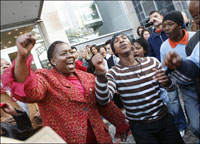 Nozizwe Madlala-Routledge and dances with TAC activists in Cape Town.