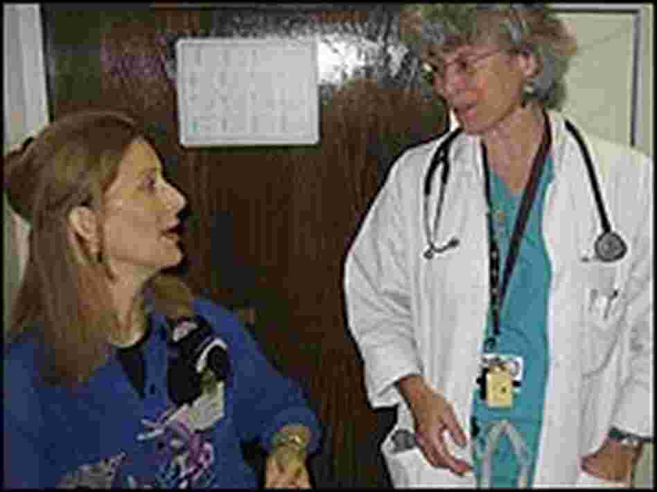 Rosemary Ciotti talks with her doctor, Sandy Caskie.