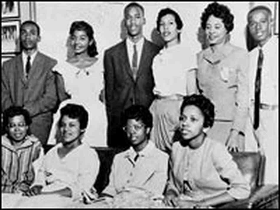 Daisy Bates stands with members of the Little Rock Nine.