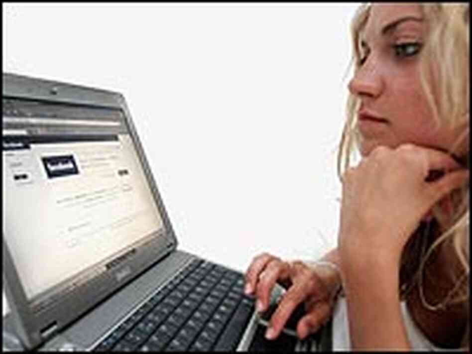 A girl browses the social networking site Facebook.
