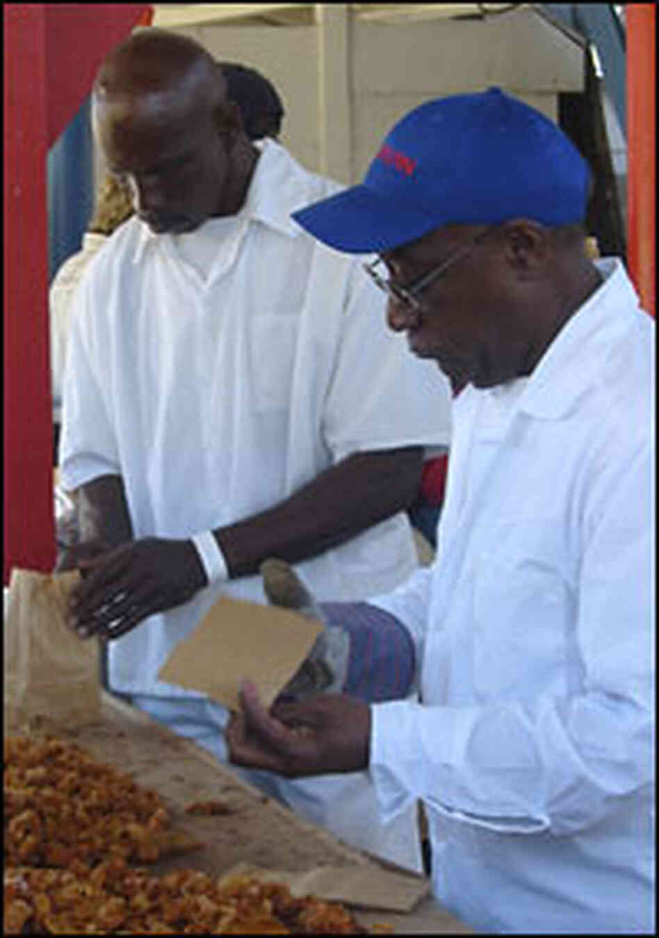 Inmates bag fresh fried cracklins.