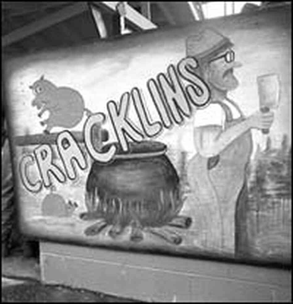 Inmates cook and make the signs that sell their southern delicacies.