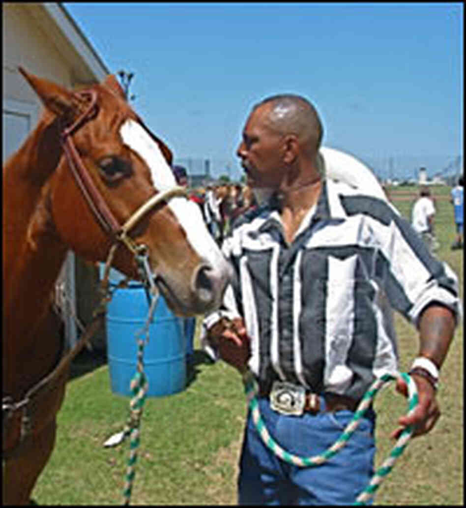 Israel Ducre and a horse.