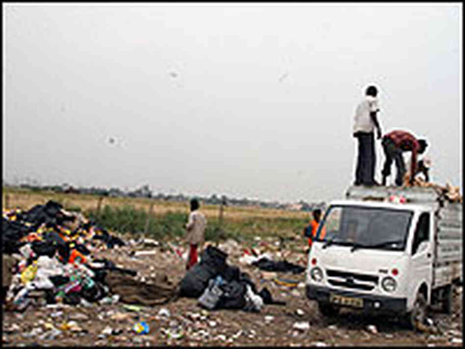 Ragpickers in India sort through trash Ragpickers in India sort through trash