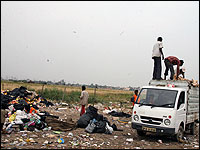 Ragpickers in India sort through trash