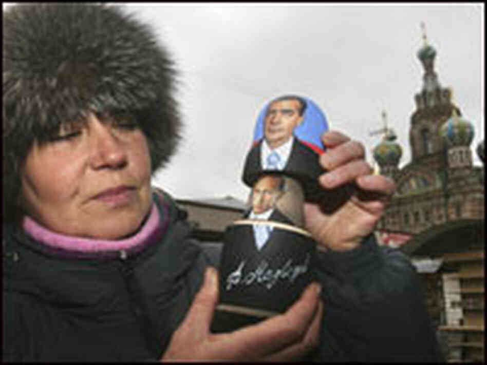Portraits of Vladimir Putin and Dmitri Medvedev adorn traditional Russian nesting dolls.