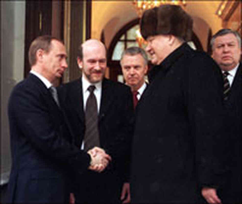 Vladimir Putin with retiring Russian President Boris Yeltsin in 1999.