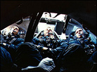 The first three humans ever to orbit the moon are shown returning safely to Earth. The first three humans ever to orbit the moon are shown returning safely to Earth.