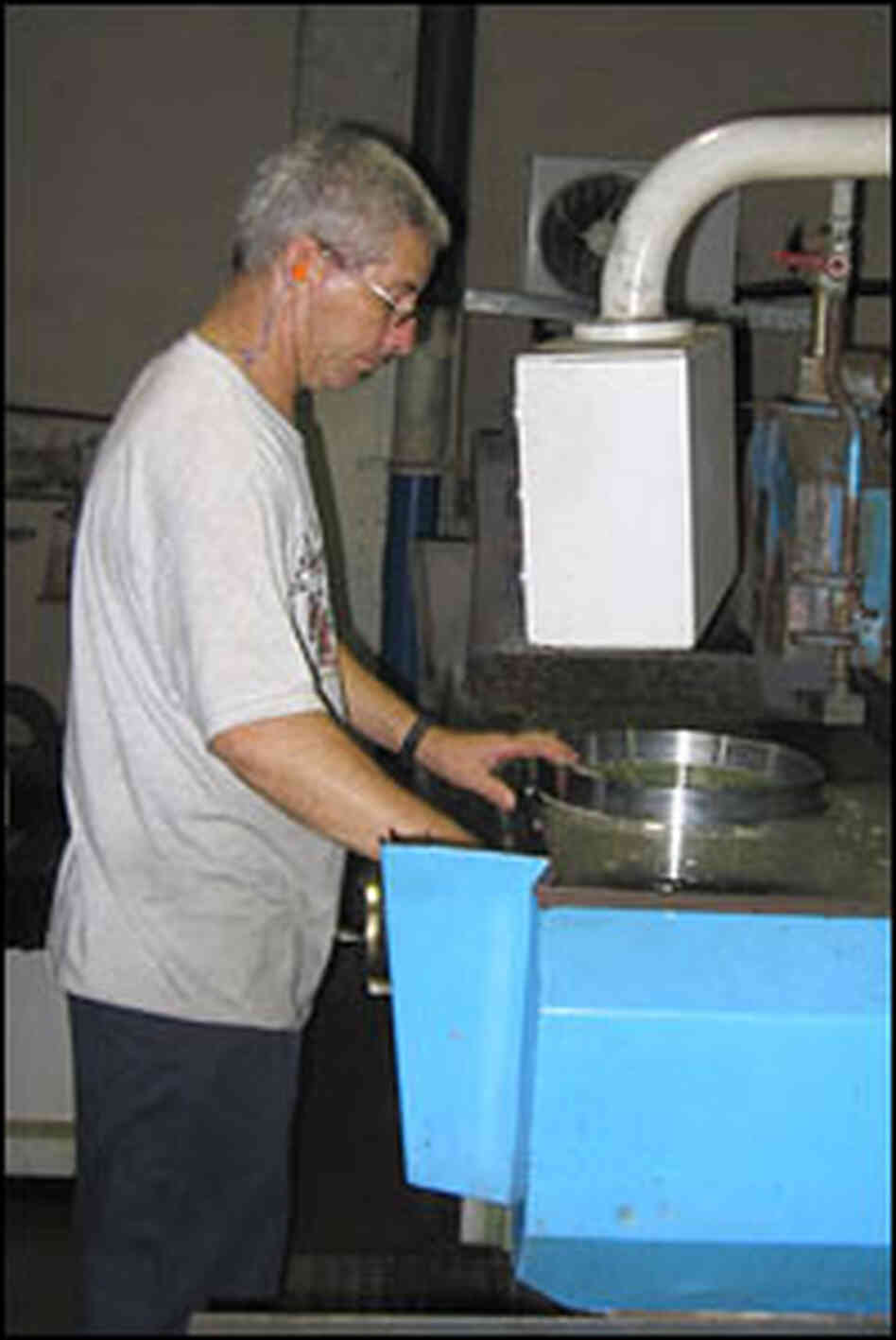 A machinist cuts steel at TechShop in San Jose.