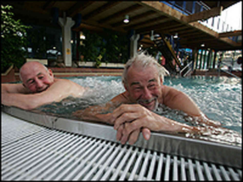 Elderly men swimming Elderly men swimming