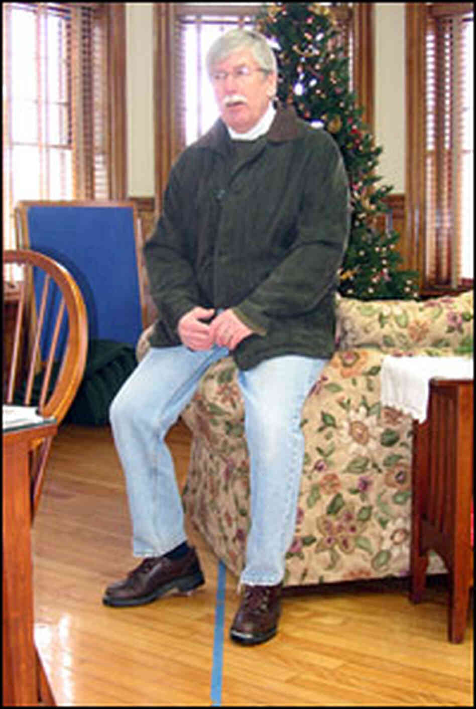 Keith Beadle straddles the U.S.-Canadian border.