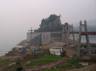 Workers build a wall around the Stone Treasure Fortress. Workers build a wall around the Stone Treasure Fortress.