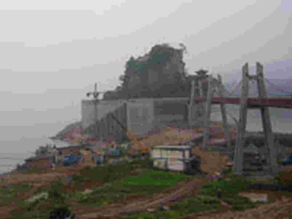 Workers build a wall around the Stone Treasure Fortress.
