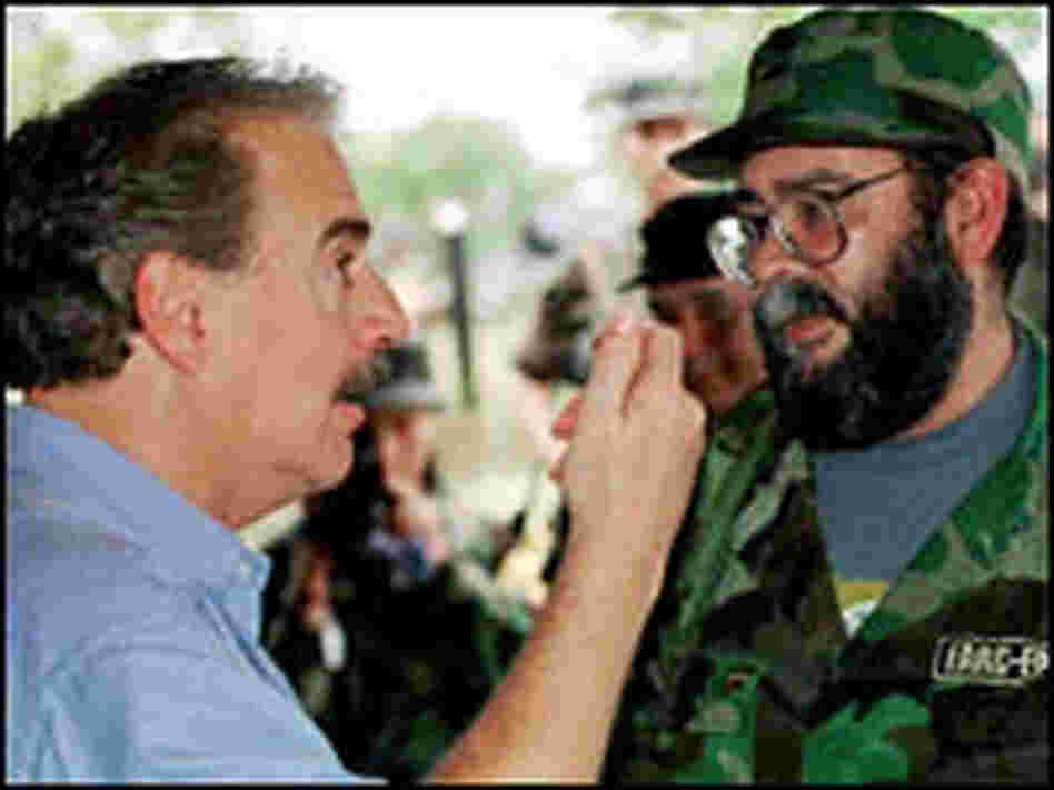 Colombia's then-President Andres Pastrana with FARC commander Alfonso Cano in 2001.