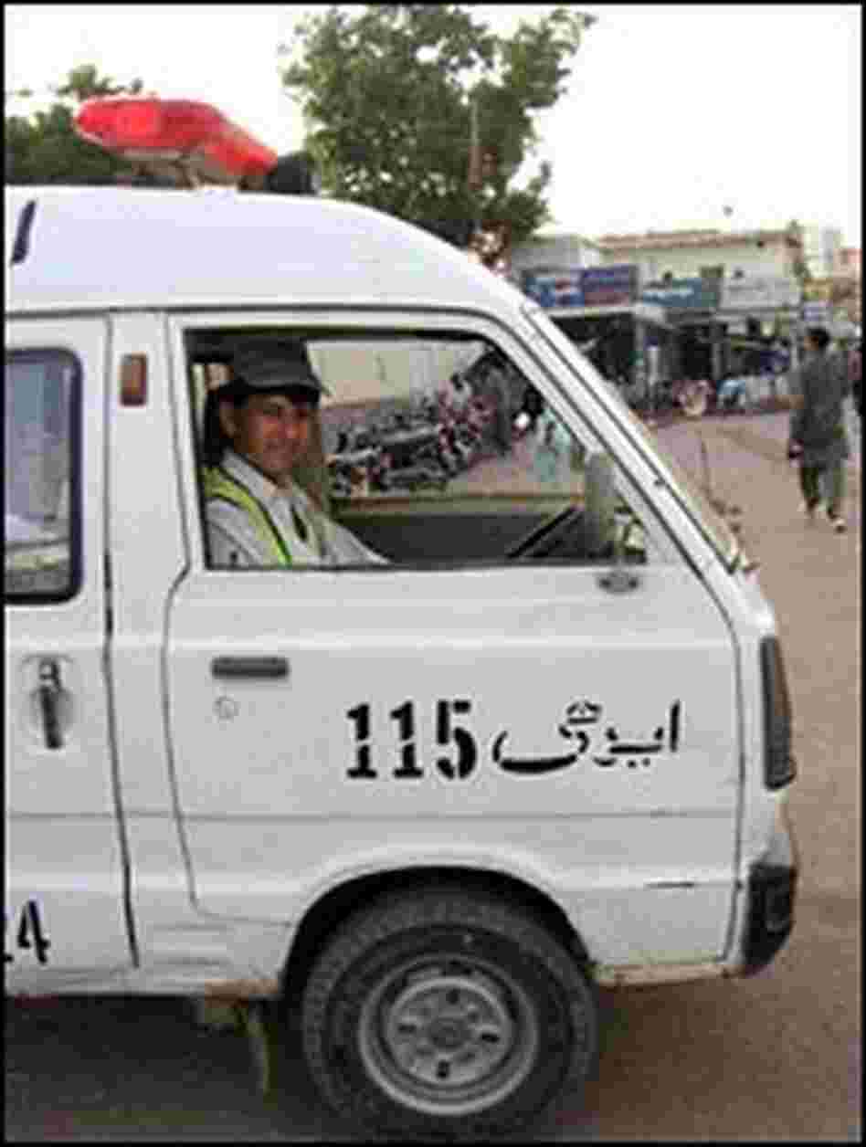 Mohammad Nader, behind the wheel of an ambulance in Karachi, Pakistan.