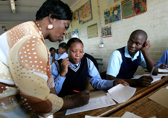 Teacher with students.