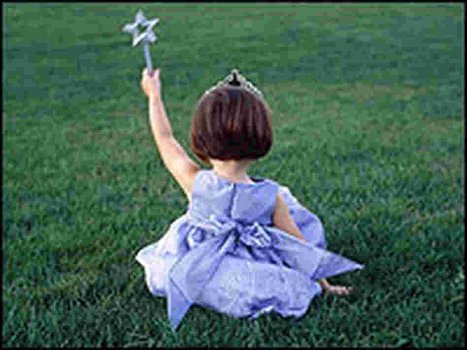 A little girl wearing a princess custome. A little girl wearing a princess custome.