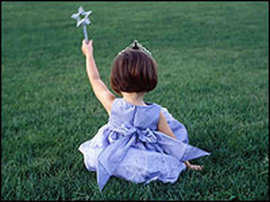 A little girl wearing a princess custome. A little girl wearing a princess custome.