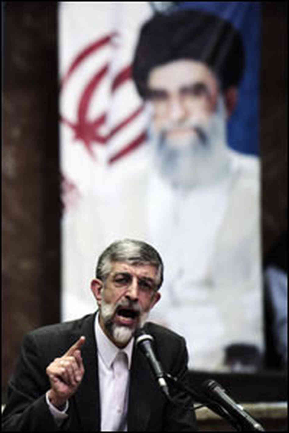Iranian parliament speaker Gholam Ali Haddad Adel speaks during a conservative rally