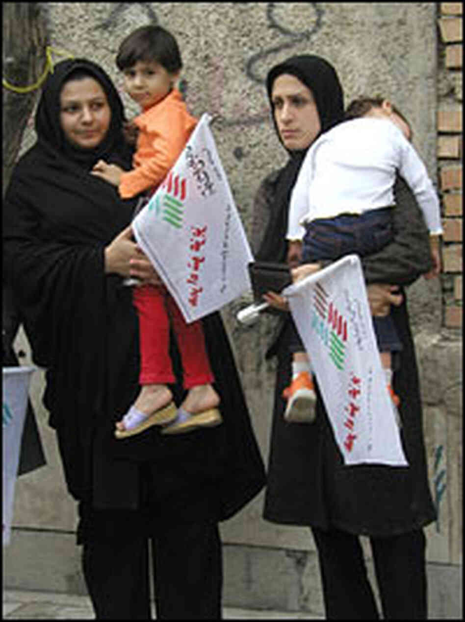 Supporters of the Coalition of Reformists attend a campaign rally.