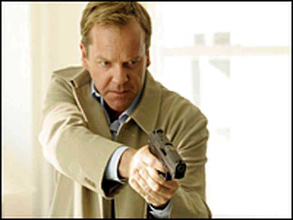 Jack Bauer (Kiefer Sutherland) with gun drawn Jack Bauer (Kiefer Sutherland) with gun drawn