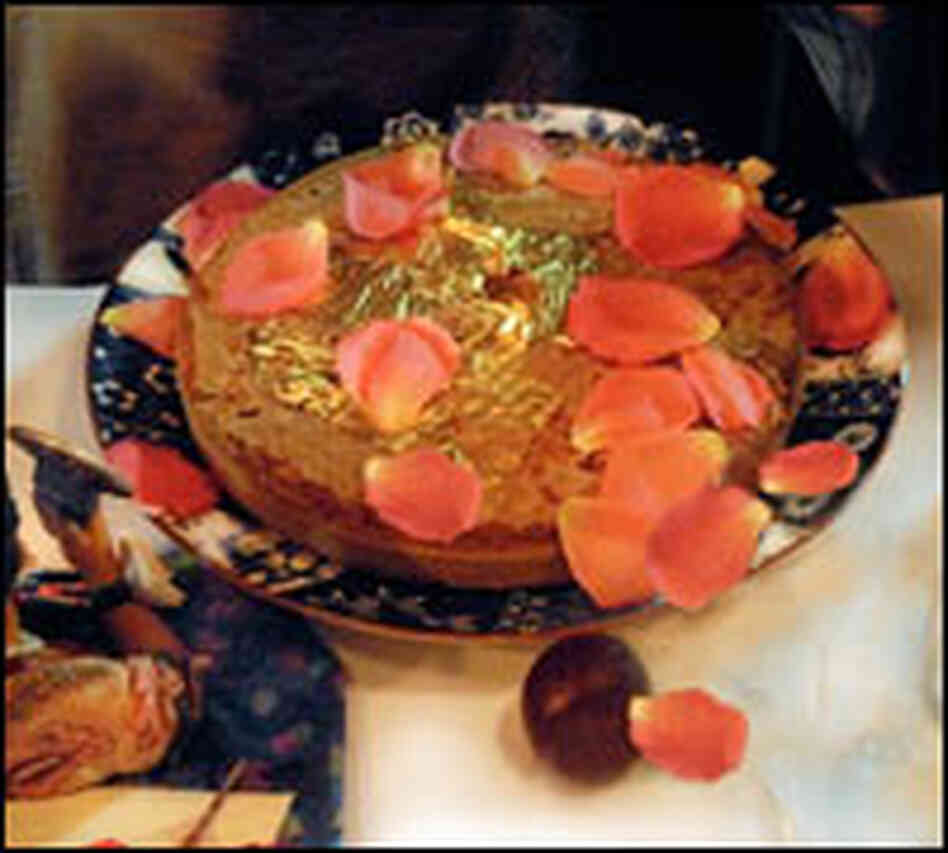 Swedish cardamom cake with the Parsi touches of rose petals and edible gold leaves.
