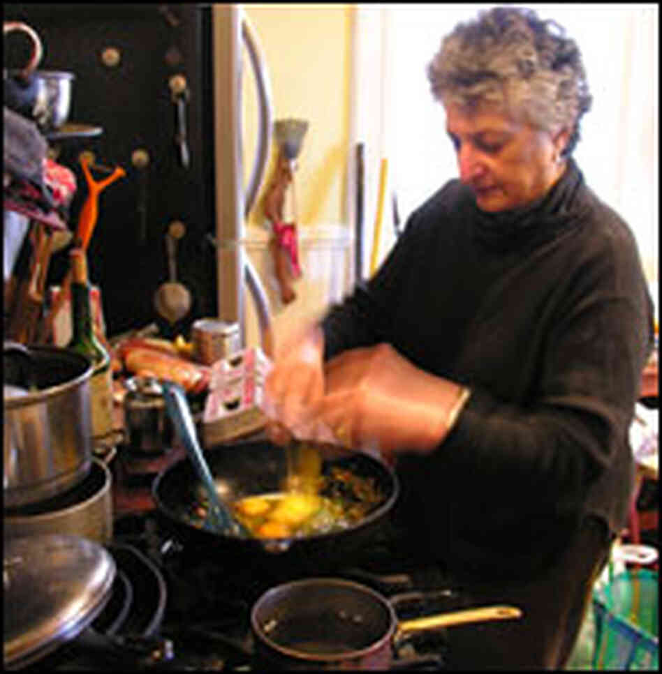 Niloufer Ichaporia King cooks Parsi eggs in one of her three kitchens.